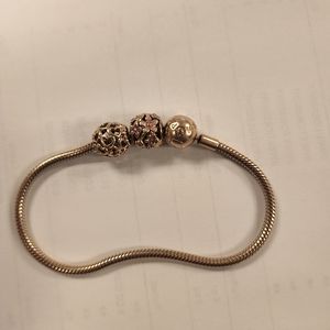 RoseGold Pandora Charm Bracelet and charms